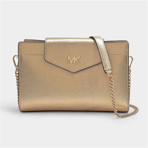 michael kors shiny gold purse|michael kors gold crossbody bag.